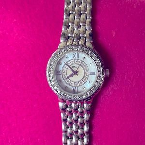 DMQ CZ stainless steel watch with Roman numerals Mother of pearl face